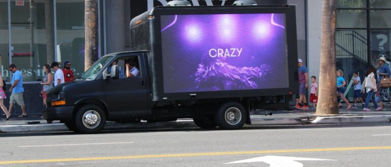 LED mobile truck displaying a vibrant media ad.