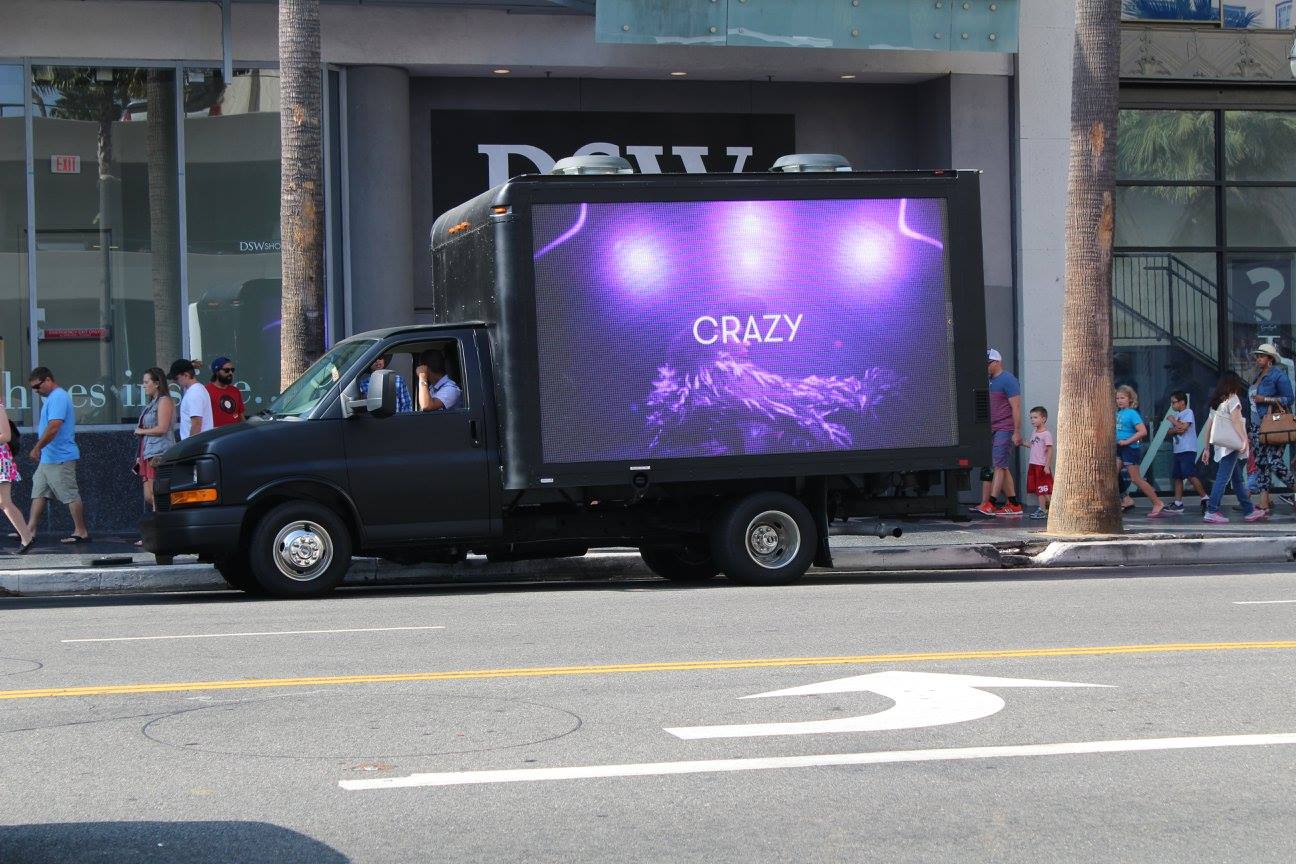 LED mobile truck displaying a vibrant media ad.