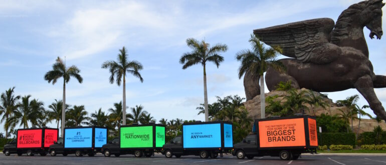 A fleet of LED advertising trucks lightened up for a brand campaign. Photo by MVS Media Group.